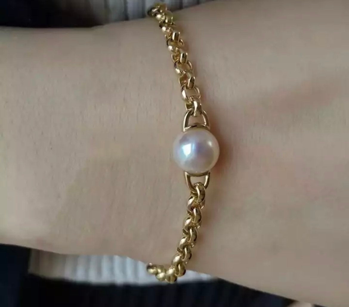 Product Detail:  18k Solid Gold Akoya Pearl Pear Size 7-8mm Weight 4g Bracelet length 18cm